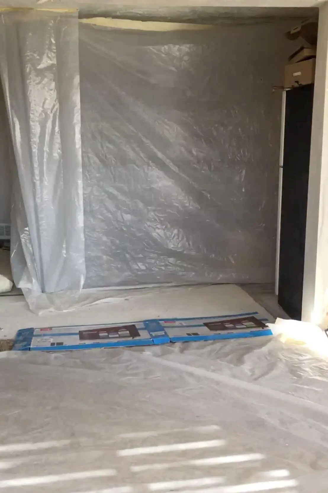 Tenting around a fireplace before tearing the stone off. 